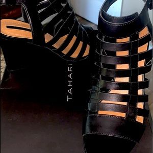 Size 7. Never worn. Leather upper. Original price was $98. Shoes are gorgeous.